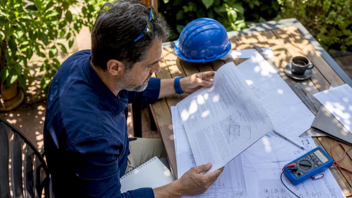 Engineer reviewing lightning protection guidelines