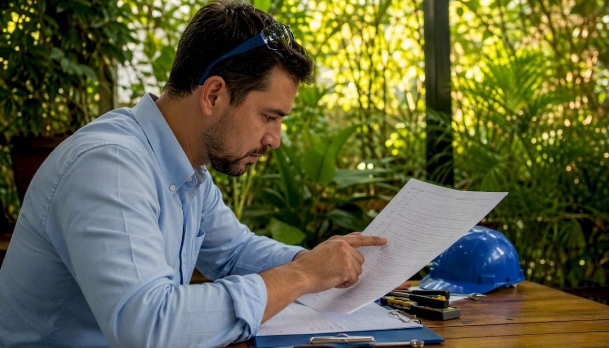 Engineer reviewing lightning rod maintenance standards
