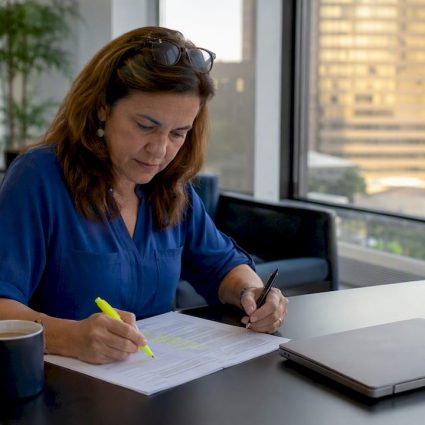 Manager reviewing NFPA compliance documents