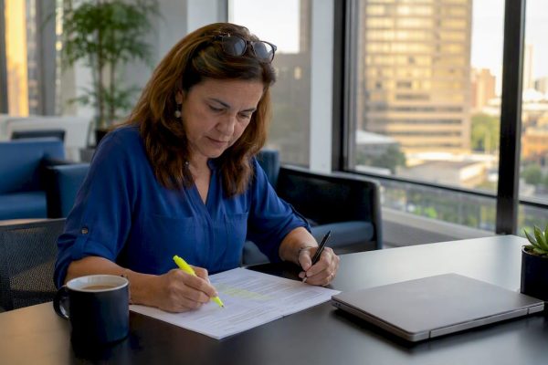 Manager reviewing NFPA compliance documents