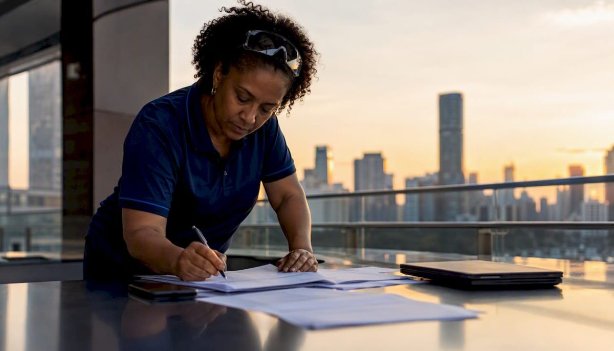 Engineer reviewing lightning protection documents