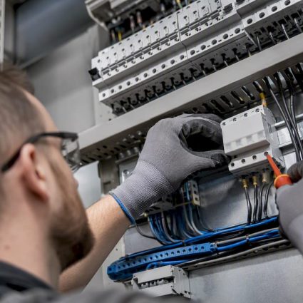 Electrician wiring Type 2 surge protector
