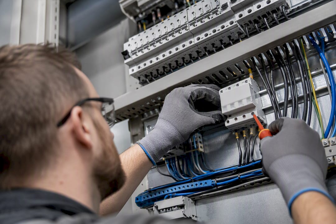 Electrician wiring Type 2 surge protector