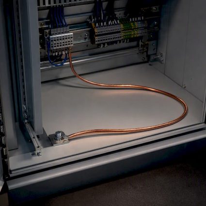 Instrumentation cabinet with long earth conductor