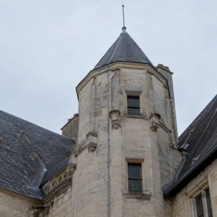 Discreet lightning conductor on a historic stone tower