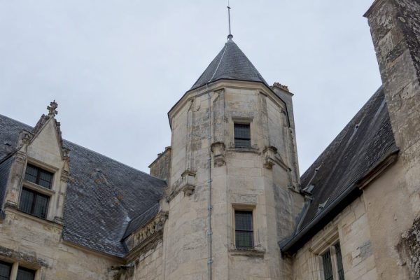 Discreet lightning conductor on a historic stone tower