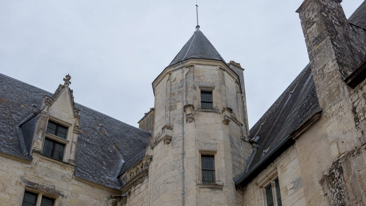 Discreet lightning conductor on a historic stone tower